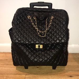 Quilted faux leather overnight bag with wheels